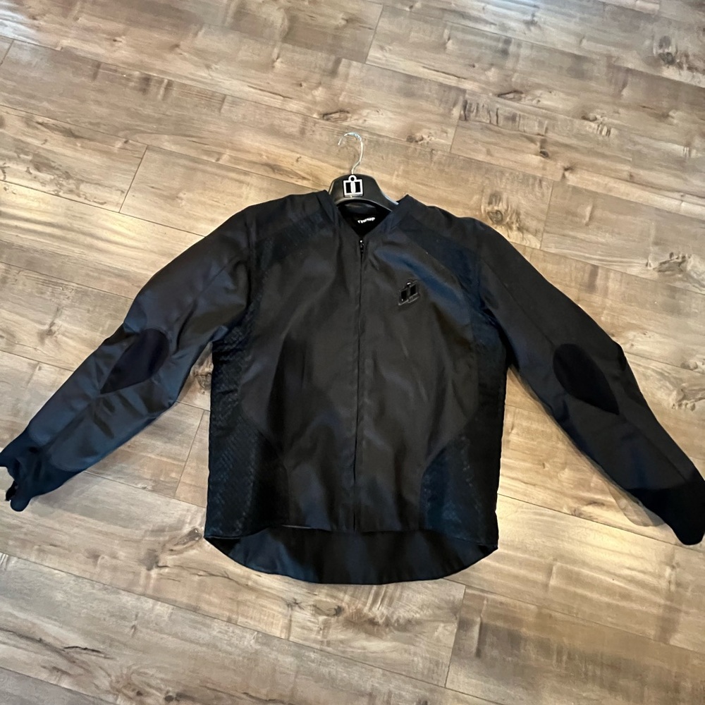 Motorcycle jacket. Men’s X-large black jacket with liner.